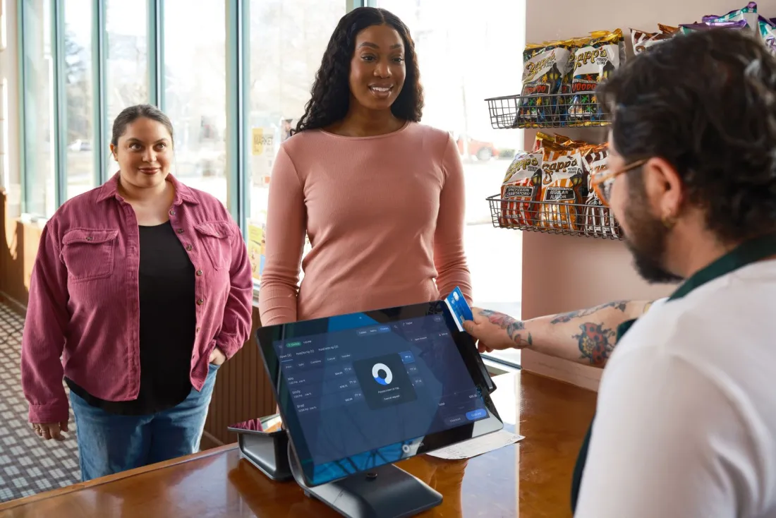 NCR Voyix Counterpoint POS at a specialty retail checkout counter