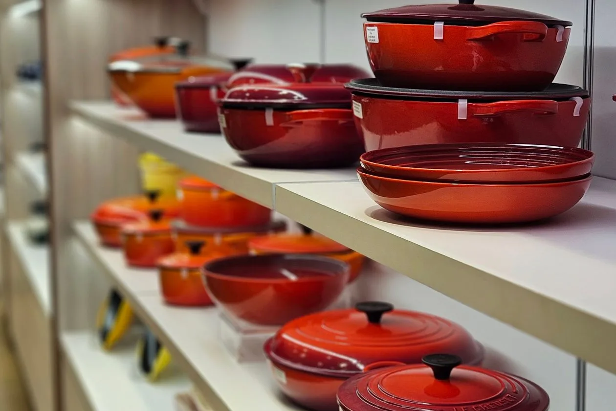 Restaurant supply store shelves stocked with commercial cookware