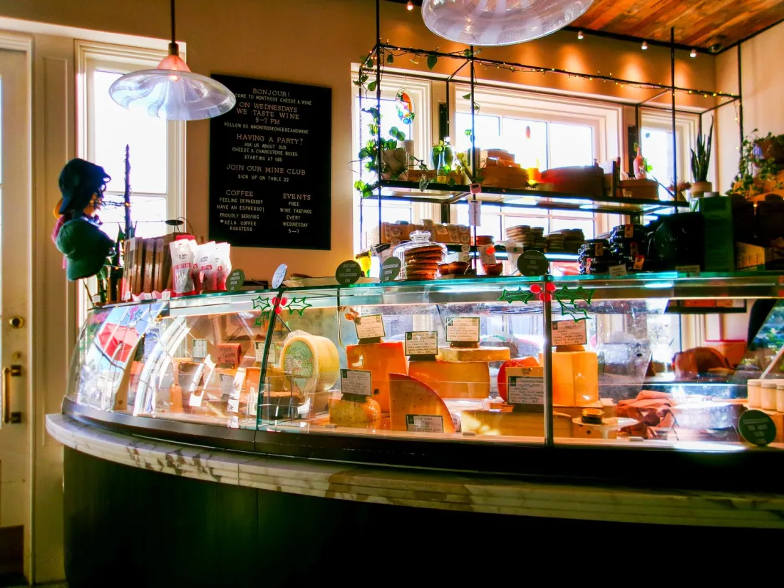 Gourmet market with cheese and wine displays